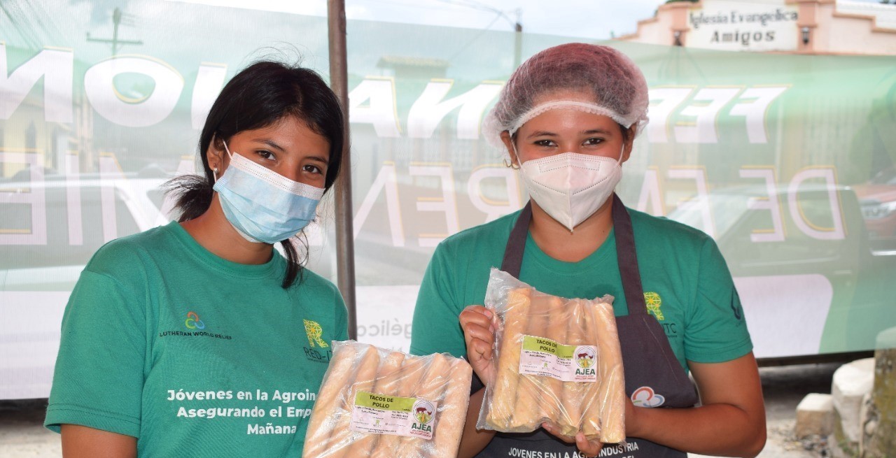 Youth entrepreneurs show off food products from their new microenterprise AJEA operating out of Laguna Verde, Azacualpa Santa Bárbara.