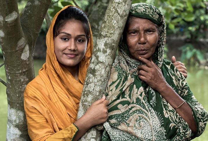 Tanzila with her grandmother near their home in Bangladesh. Photo Plan International.