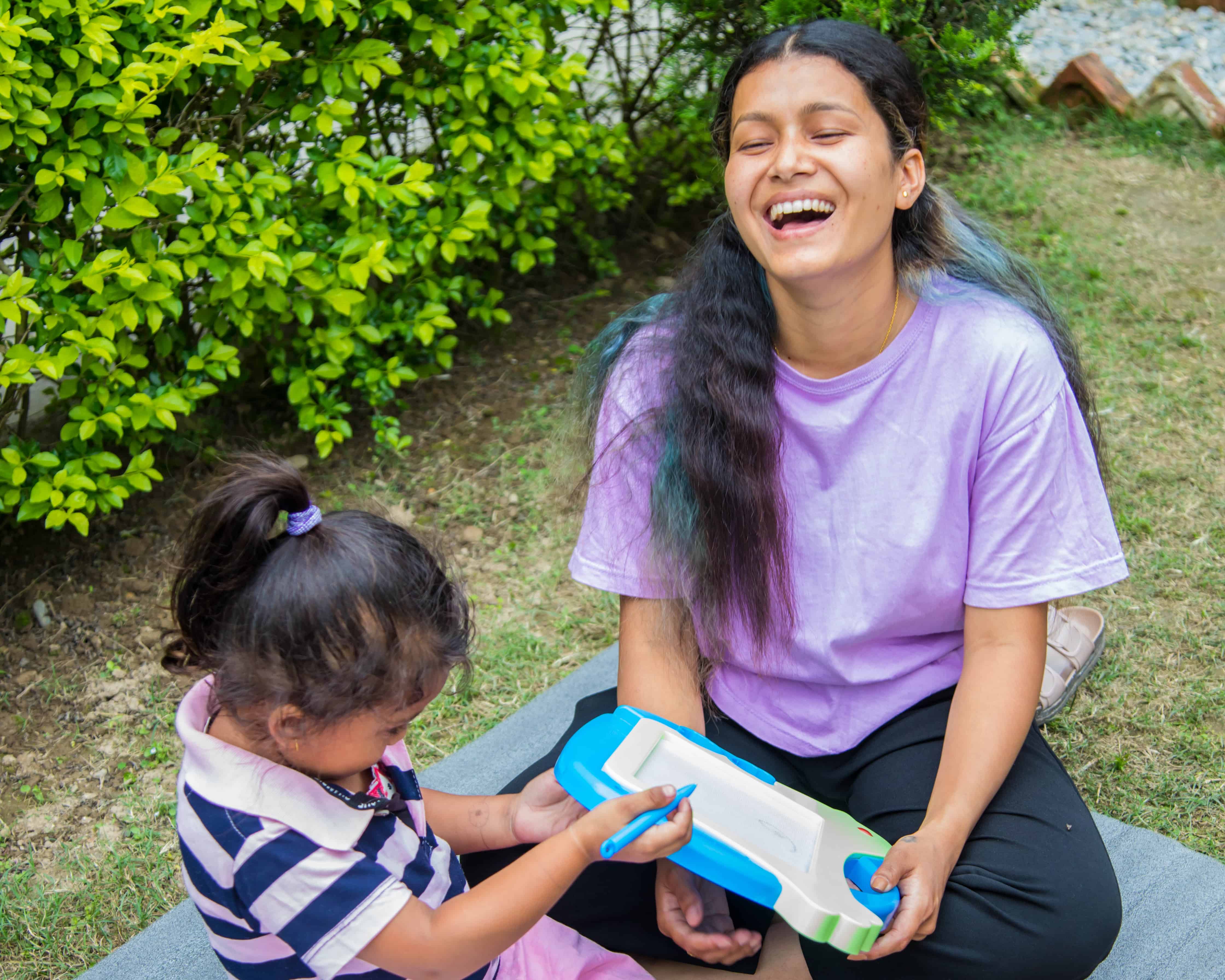 Urmila, age 20, learns child care skills during an early childhood development training.