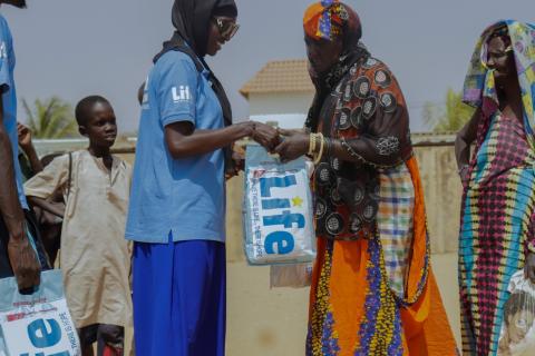 Distributing food baskets in Senegal.
