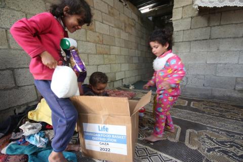 Food baskets and iftar trays distributed to families in Gaza.