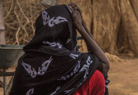Woman sitting in IDP camp in Somalia