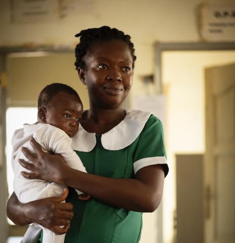 Midwife Florence Anyoka holds baby Nathanial at the Community Health Centre, Upper East Region, Ghana